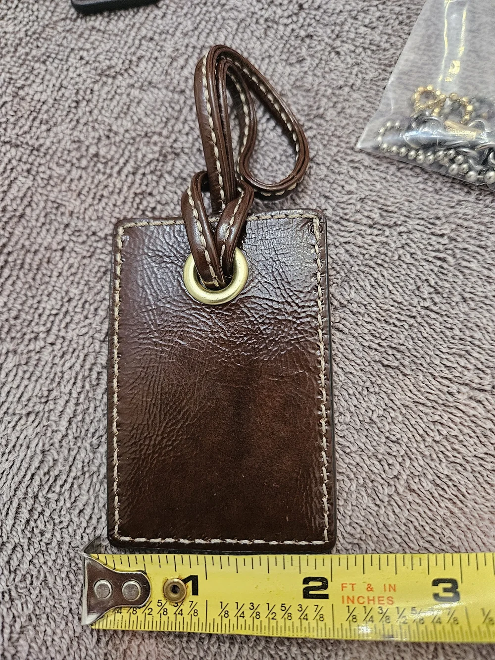 COACH Hangtag, Key Tag with Silver Key Charms. 25.00 Each
